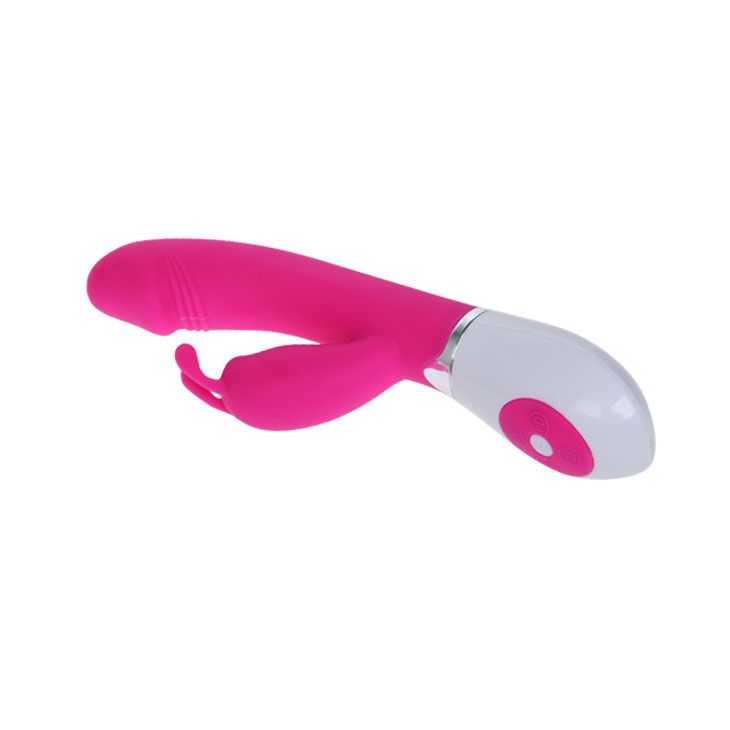 Rosa Vibrator mit weißem Sockel. Hat eine längliche Form mit einem erhabenen Teil und zwei kleineren Elementen.
