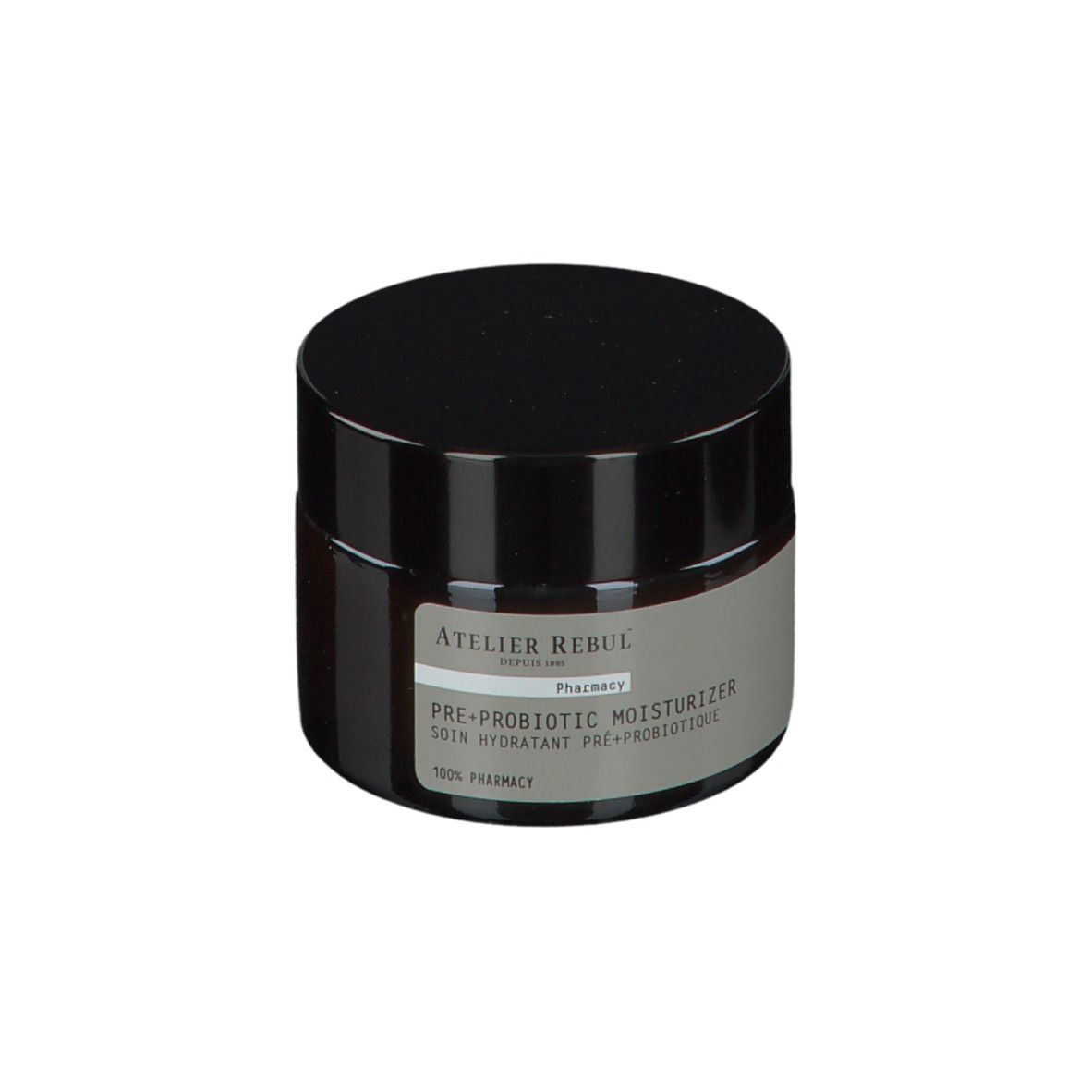Bruine crèmepot met zwarte deksel. Op het etiket staat: ATELIER REBUL PRE+ PROBIOTIC MOISTURIZER.
