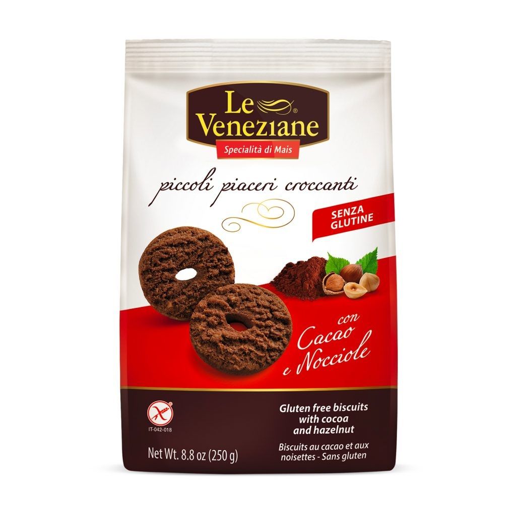 Verpackung mit glutenfreien Keksen mit Kakao und Haselnuss. Marke Le Veneziane. Aufschrift: piccoli piaceri croccanti.