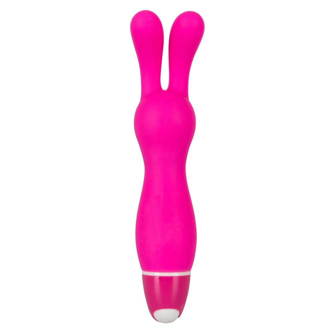 Pinkfarbener Vibrator mit zwei Ohren. Das Produkt hat eine glatte Oberfläche und eine weiße Spitze.