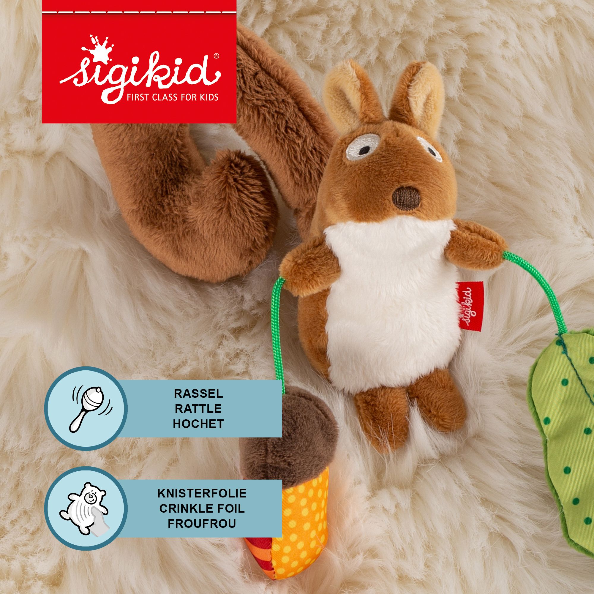 SIGIKID Anhänger mit Eichhörnchen, Eichel, Blatt, Hinweisen zu Rassel und Knisterfolie.