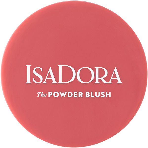 Runder, korallenfarbener IsaDora Powder Blush. Weißer Schriftzug: IsaDora, The Powder Blush. Geschlossene Verpackung.