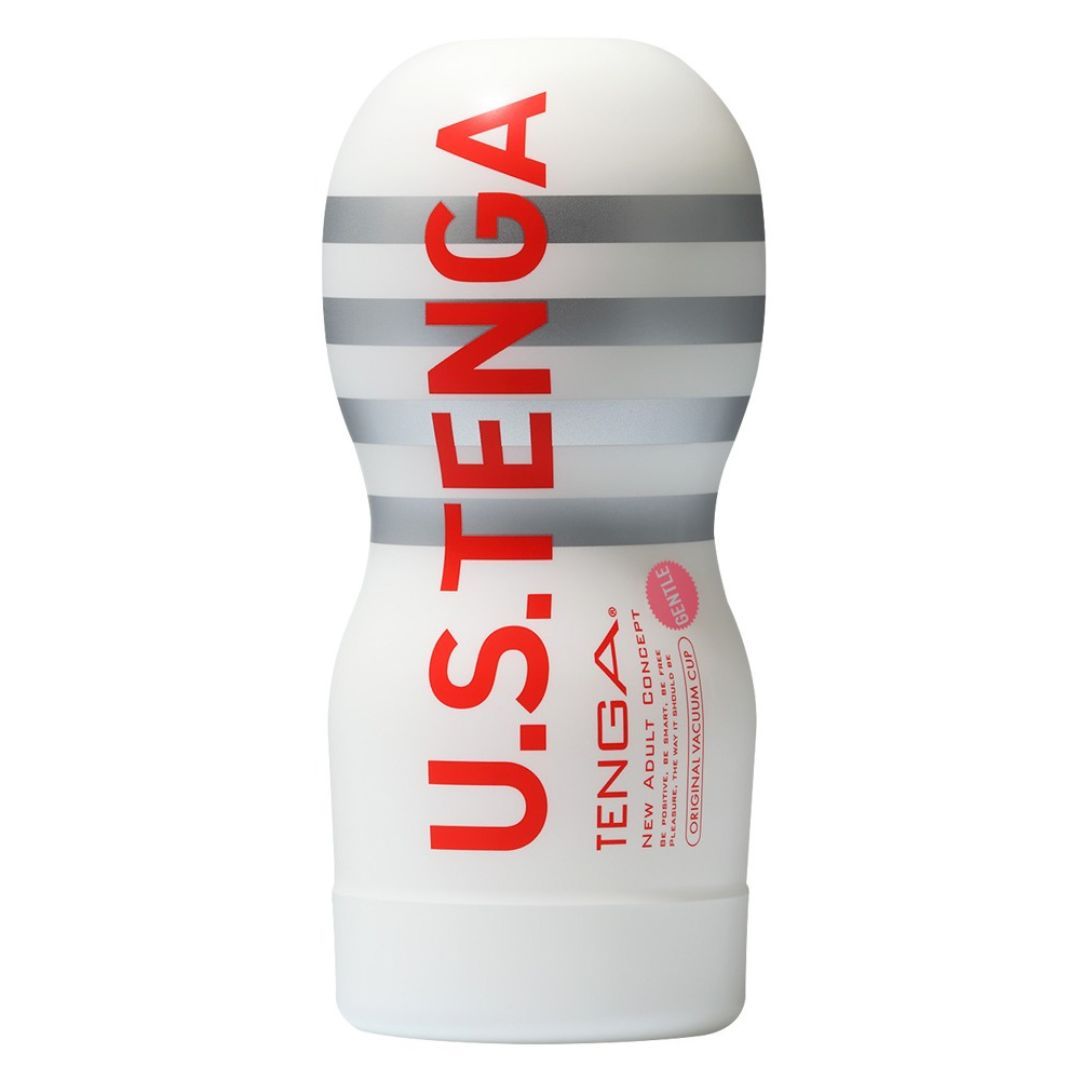 Weißes, zylindrisches Produkt mit roten und silbernen Streifen. U.S. TENGA-Logo in Rot. Text: ORIGINAL VACUUM CUP.