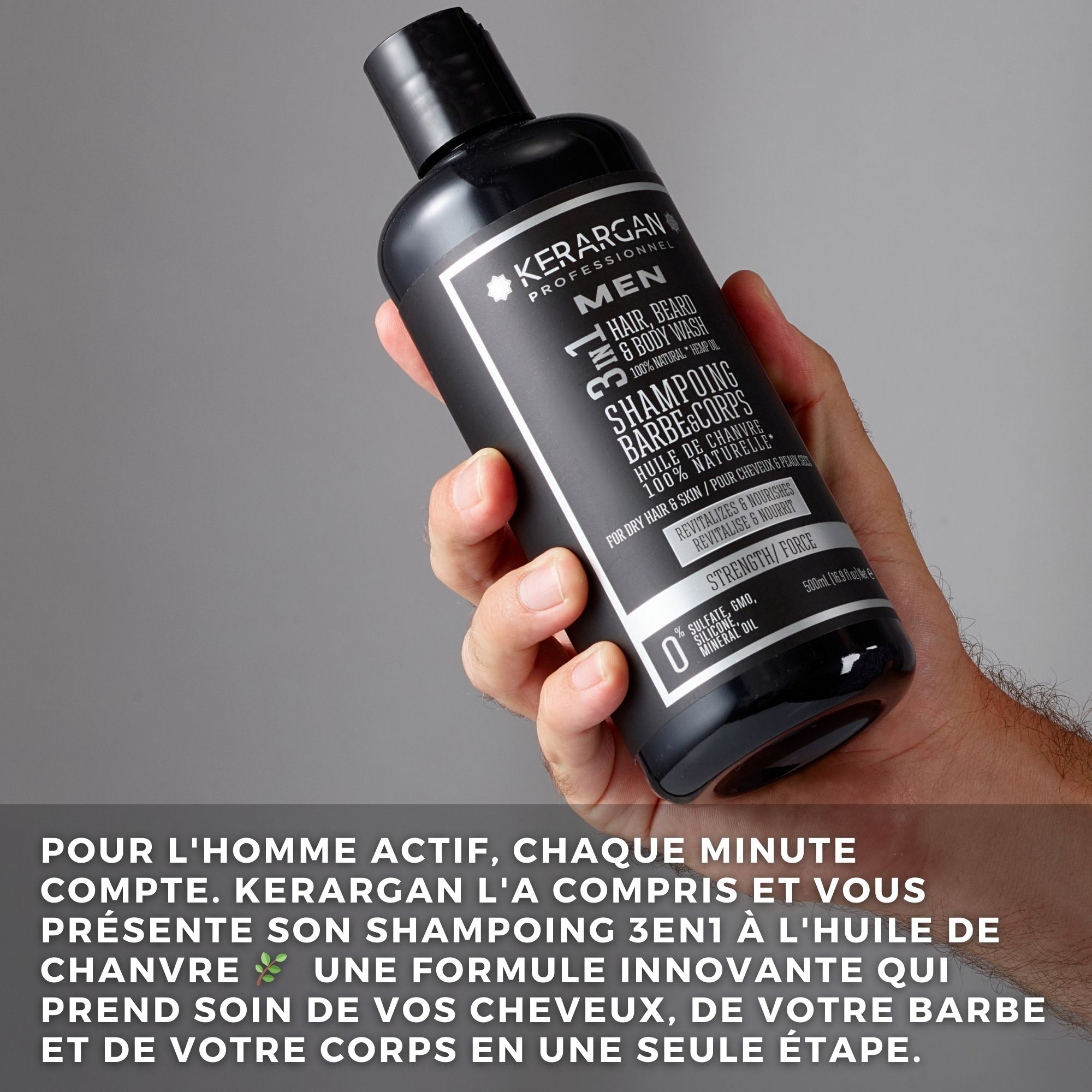 Main tenant un flacon de shampooing noir. Texte : Kerargan, Men, 3en1 Hair, Beard & Body Wash. Huile de chanvre.