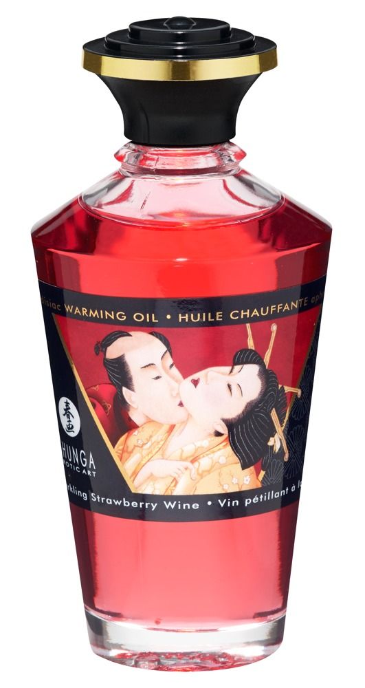 Rote Glasflasche mit schwarzem Deckel und Etikett. Aufdruck: Shunga, Warming Oil, Erdbeer-Aroma. Abbildung: küssendes Paar.