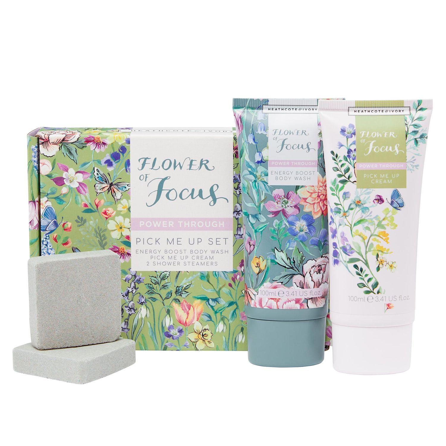 Geschenkset mit floralem Muster. Enthält Body Wash, Creme und Dusch-Steamer. Text: Flower of Focus, Pick Me Up Set.