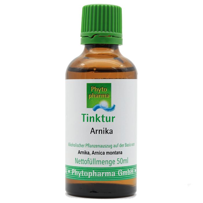 Braune Glasflasche mit grünem Deckel. Etikett mit "Tinktur Arnika" und "Phytopharma".