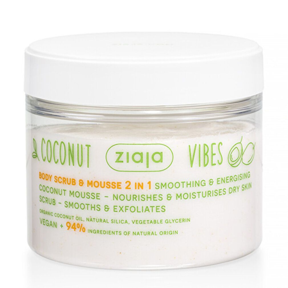 Ziaja Coconut Vibes Körperpeeling und Mousse 2 in 1. Weißer Behälter mit Etikett, das Kokosnuss und Orangen zeigt.