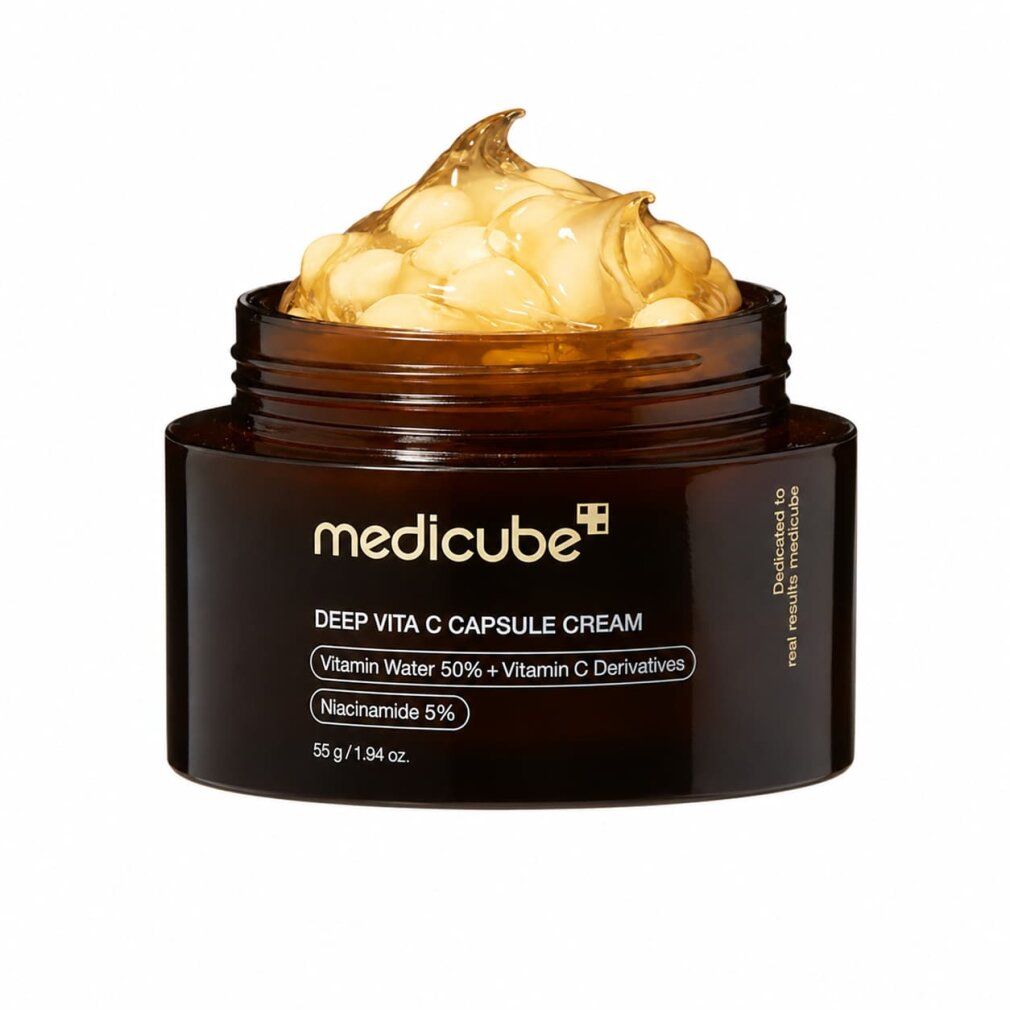 Offener Tiegel Medicube Deep Vita C Capsule Cream mit sichtbaren Kapseln.
