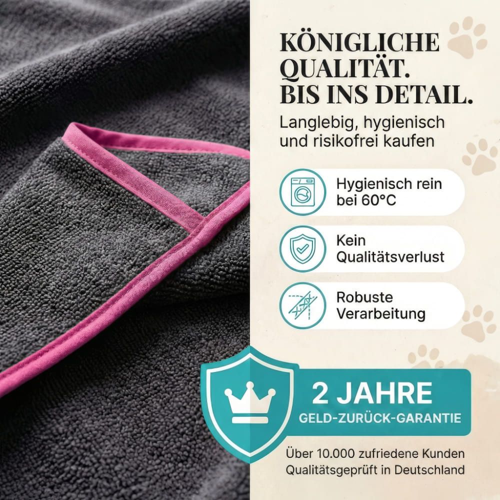 Graues Hundehandtuch mit rosa Einfassung. Text: Königliche Qualität. Bis ins Detail. Hygienisch rein bei 60°C. 2 Jahre Geld-zurück-Garantie.