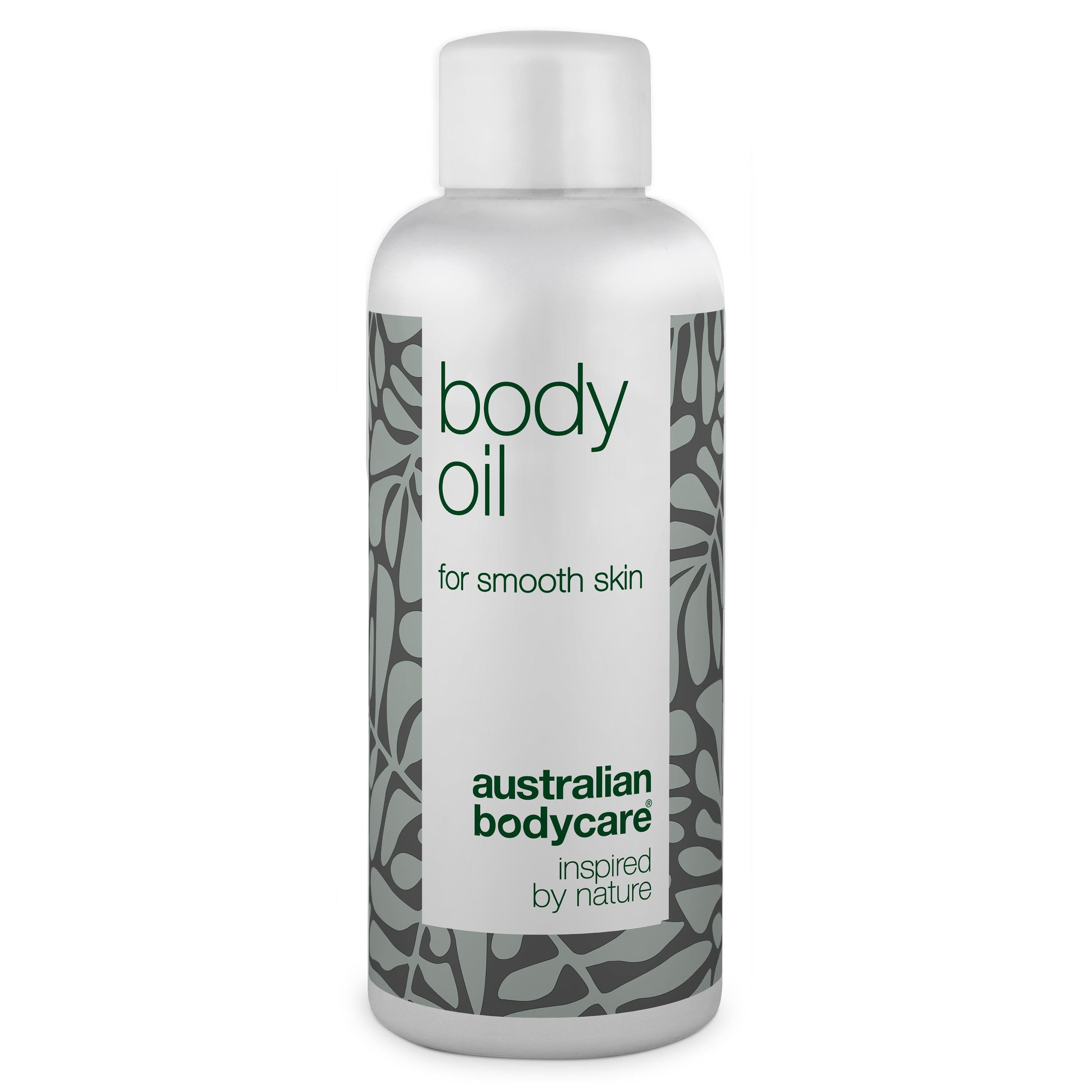 Witte body oil fles. Opschrift: body oil, for smooth skin. Merk: Australian Bodycare.