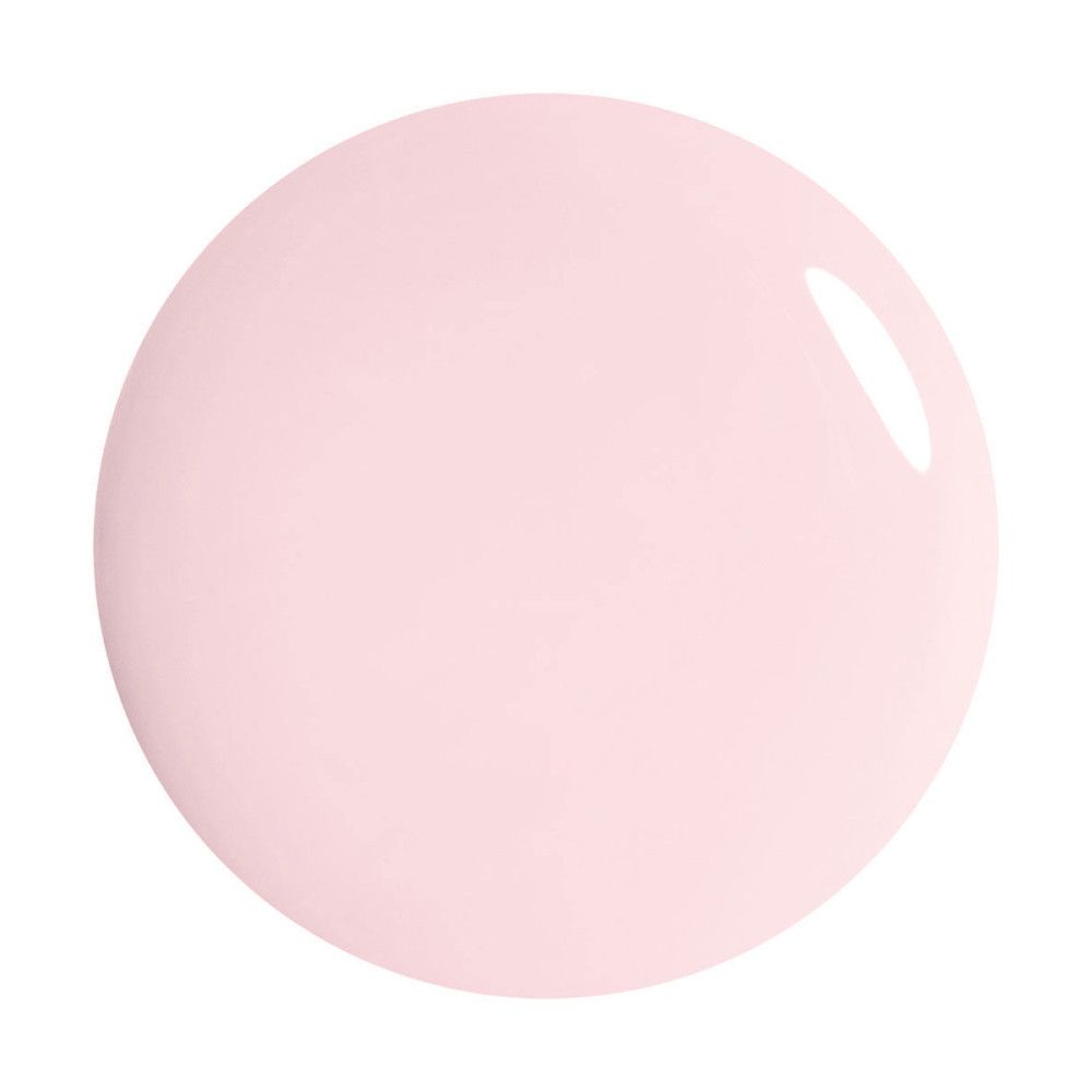Rosa Nagellack-Tropfen auf weißem Hintergrund. Runde Form, glänzende Oberfläche.