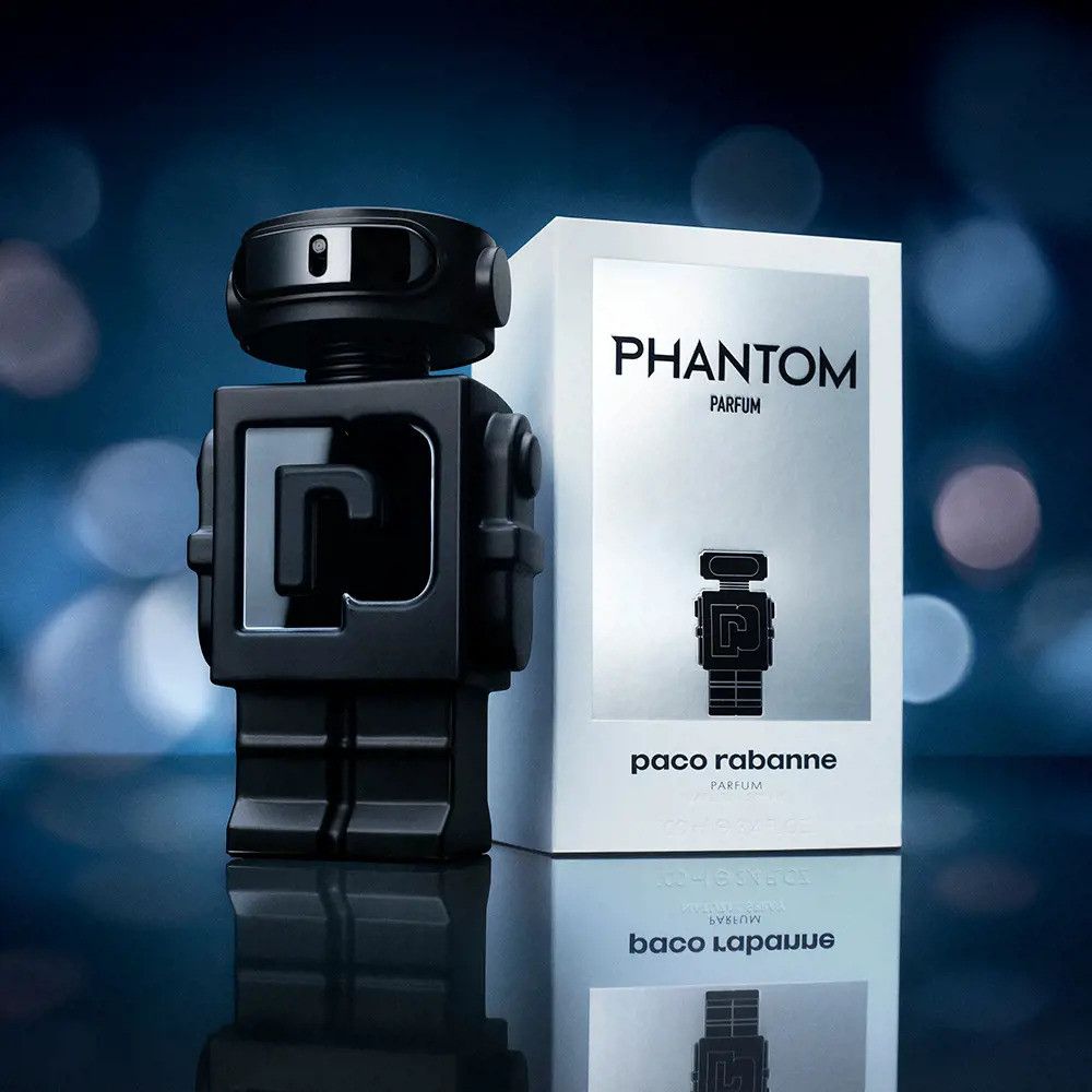 Schwarzer Flakon in Roboterform und Verpackung. Aufschrift: PHANTOM PARFUM, paco rabanne.