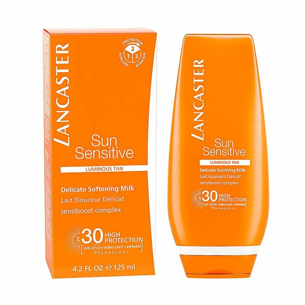 Orange Tube und Schachtel. Lancaster Sun Sensitive Luminous Tan SPF 30. Milch. Text.