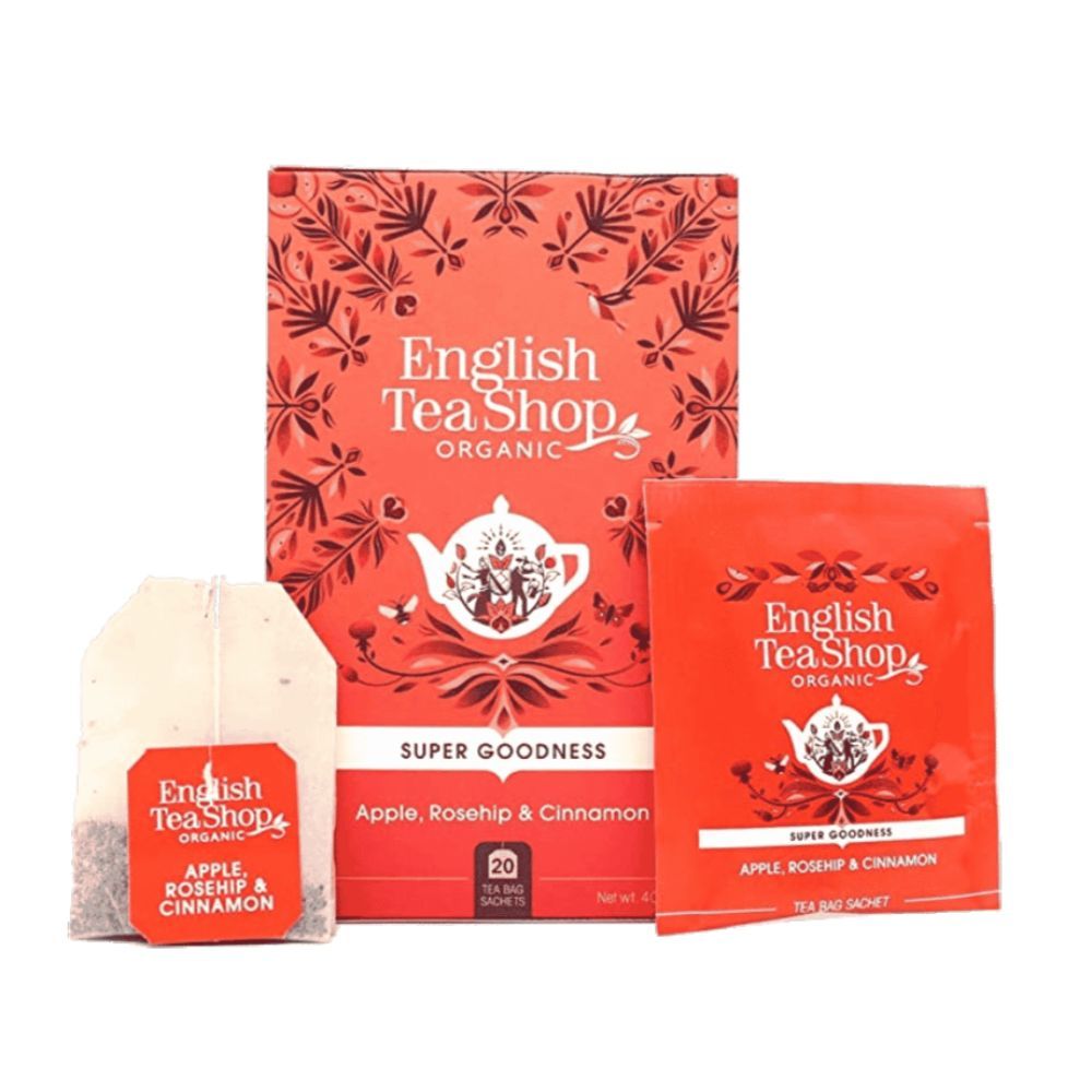 Verpackung mit Teebeutel und Einzelverpackung. "English Tea Shop Organic" und "Apple, Rosehip & Cinnamon" Text.