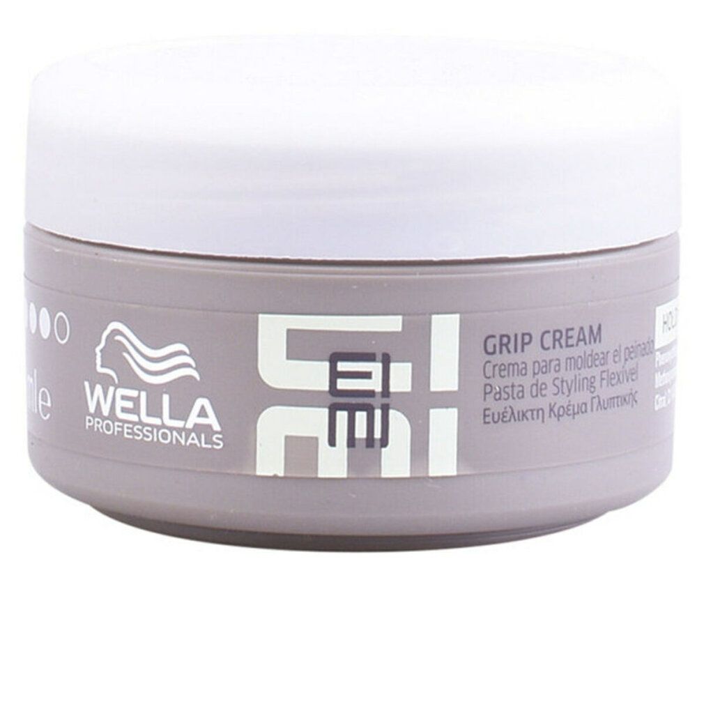 Behälter mit weißem Deckel. Aufschrift: Wella Eimi Grip Cream. Mehrsprachige Produktbezeichnungen.