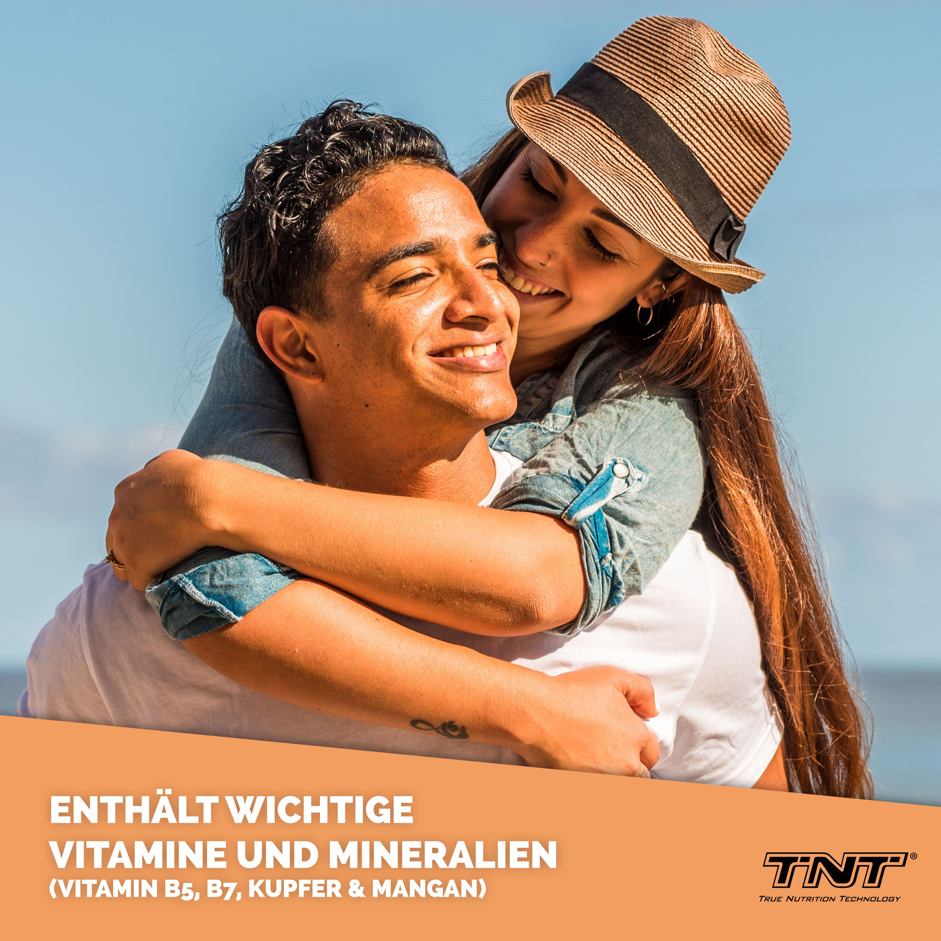 Paar umarmt sich. Text: Enthält wichtige Vitamine und Mineralien. TNT Logo.