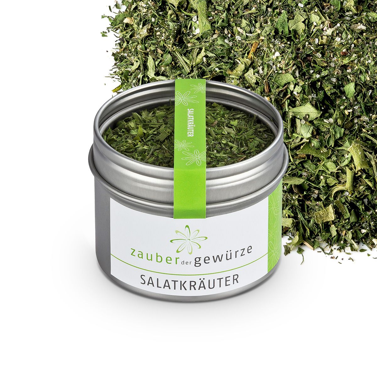 Geöffnete Dose Salatkräuter. Aufschrift: Zauber der Gewürze Salatkräuter. Grünes Etikett mit Salatkräuter. Kräuter daneben.