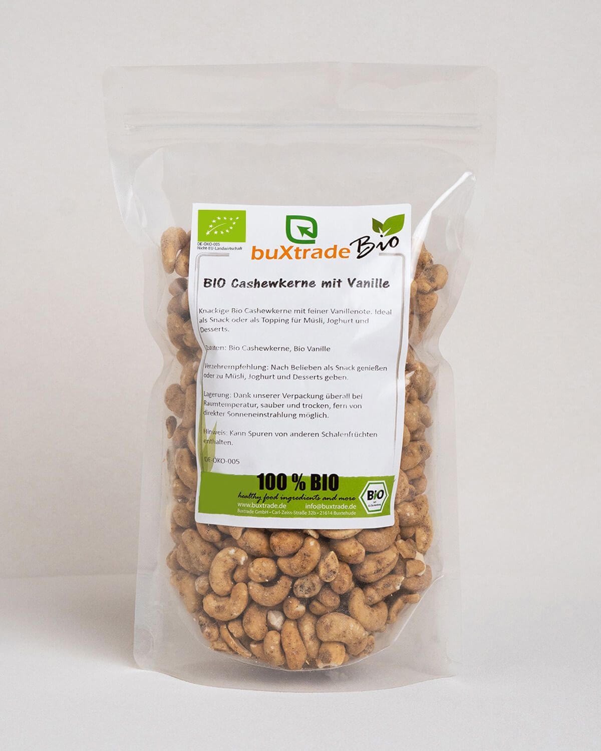 Biuxtrade Bio Cashewkerne mit Vanille in transparenter Verpackung. 100% Bio-Siegel.