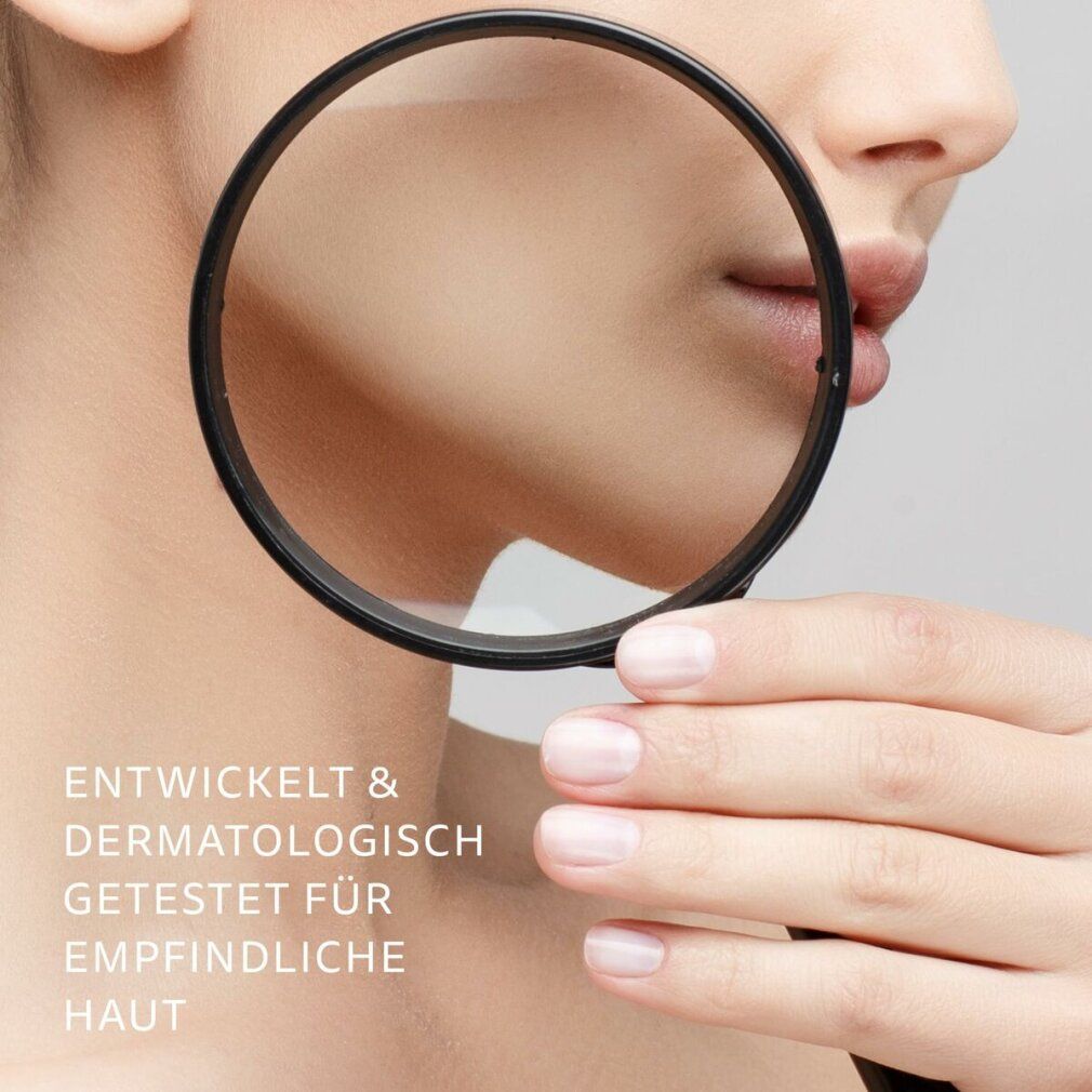 Gesicht mit Lupe. Text: Entwickelt & dermatologisch getestet für empfindliche Haut.