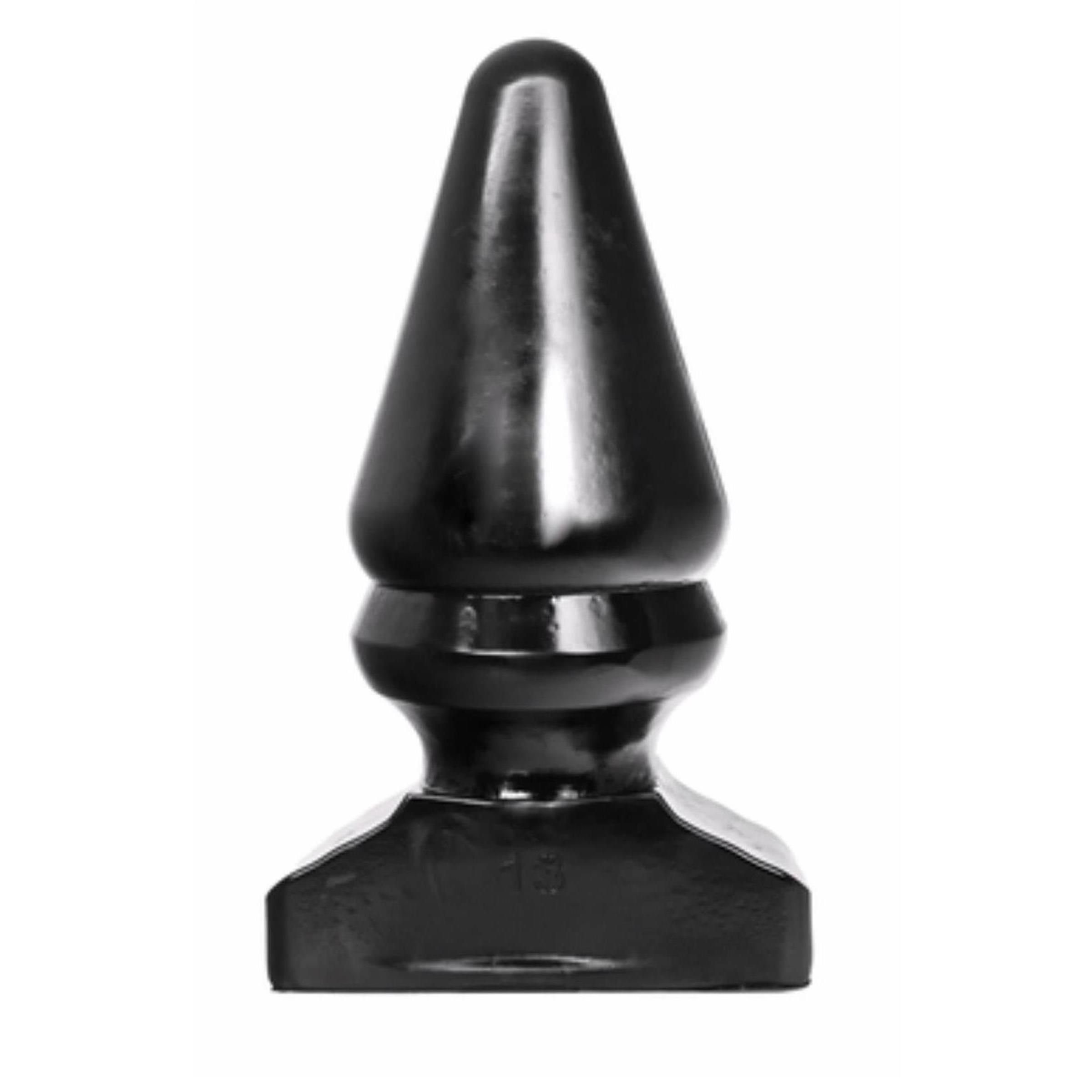 Schwarzer, konischer Analplug. Kegelförmiger Kopf, zylindrischer Schaft mit zwei Ringen, rechteckige Basis. Glänzende Oberfläche.