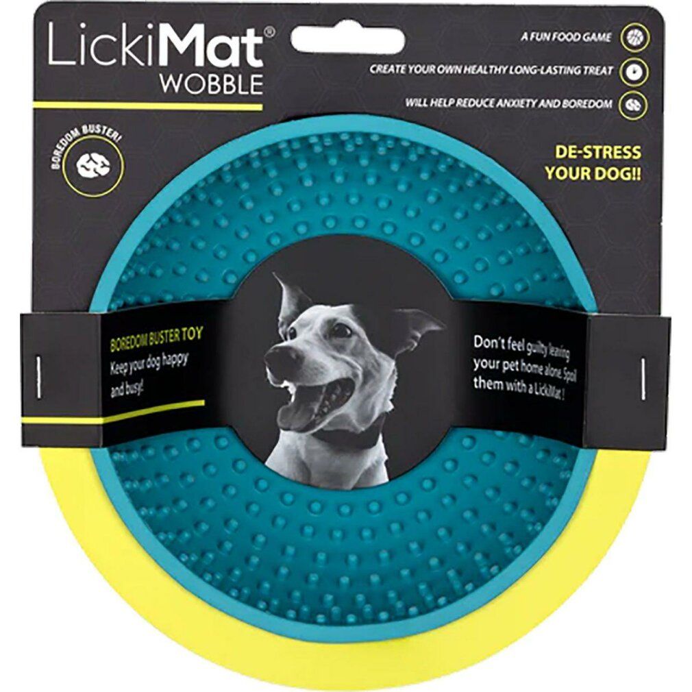 LickiMat Wobble in Verpackung. Runde Form, türkis mit gelbem Rand. Hundefoto. Text: 'Boredom Buster' und 'De-Stress Your Dog'.