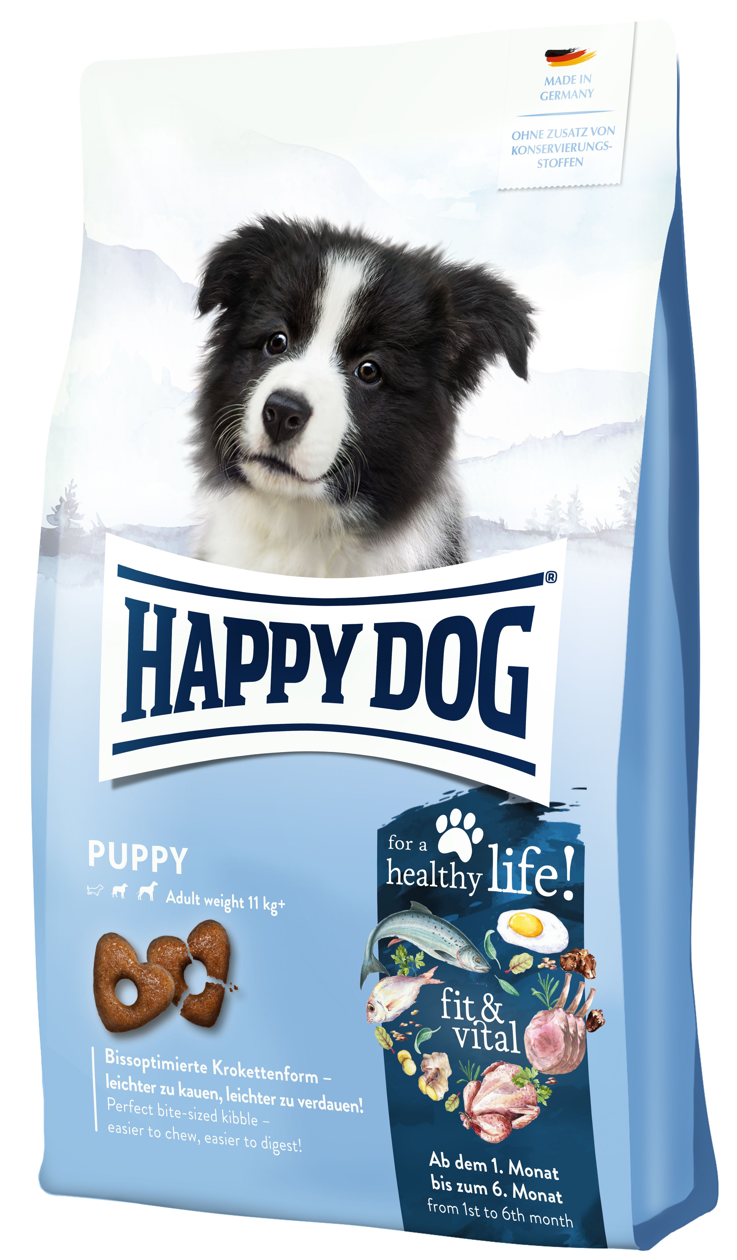 Hundefutter-Beutel mit Welpen-Foto. Aufschrift: HAPPY DOG PUPPY. Enthält Kroketten. Für ein gesundes Leben. Ab dem 1. Monat.