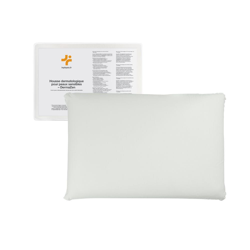 Weißes Kissen mit Verpackung. Auf der Verpackung steht "INPHYSIO Housse Dermatologique pour Peaux Sensibles – DermaZen".