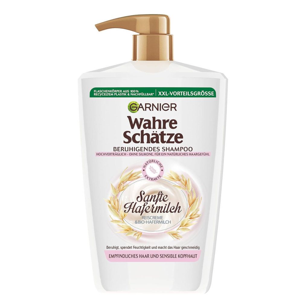 Weißer Shampoo-Flakon mit goldfarbenem Pumpkopf. Aufschrift: Garnier Wahre Schätze Sanfte Hafermilch. XXL-Vorteilsgröße. Text: Beruhigendes Shampoo.