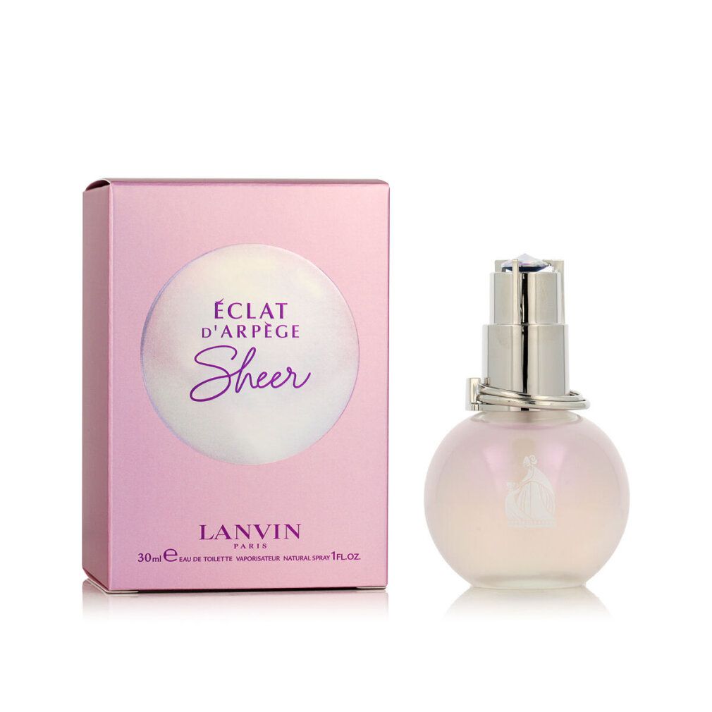 Rosa Verpackung und Flakon. Auf der Verpackung steht "Éclat d'Arpège Sheer". Der Flakon ist rund und hat einen silbernen Verschluss.