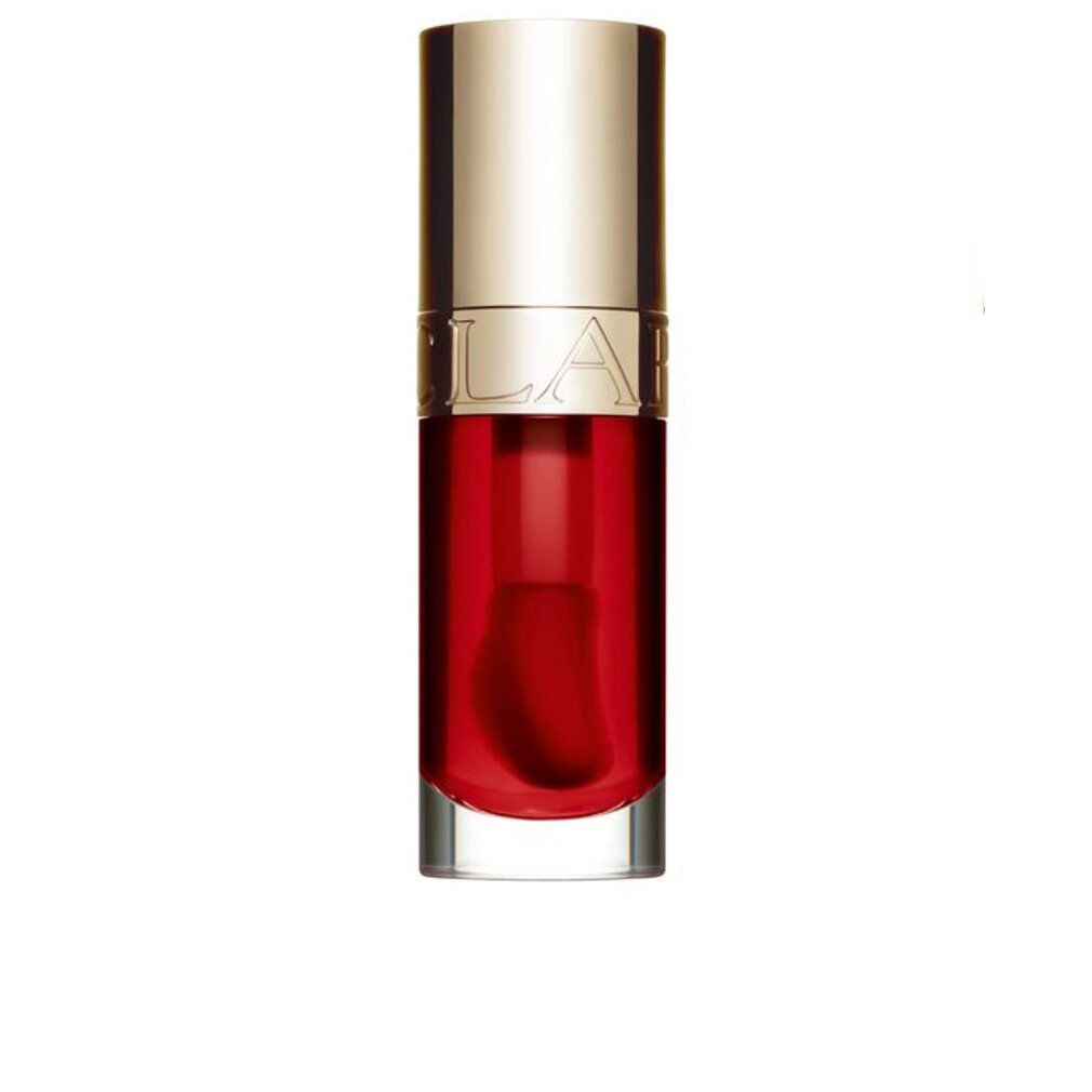 Transparente Flasche mit roter Flüssigkeit und goldenem Deckel. Aufschrift: CLARINS.