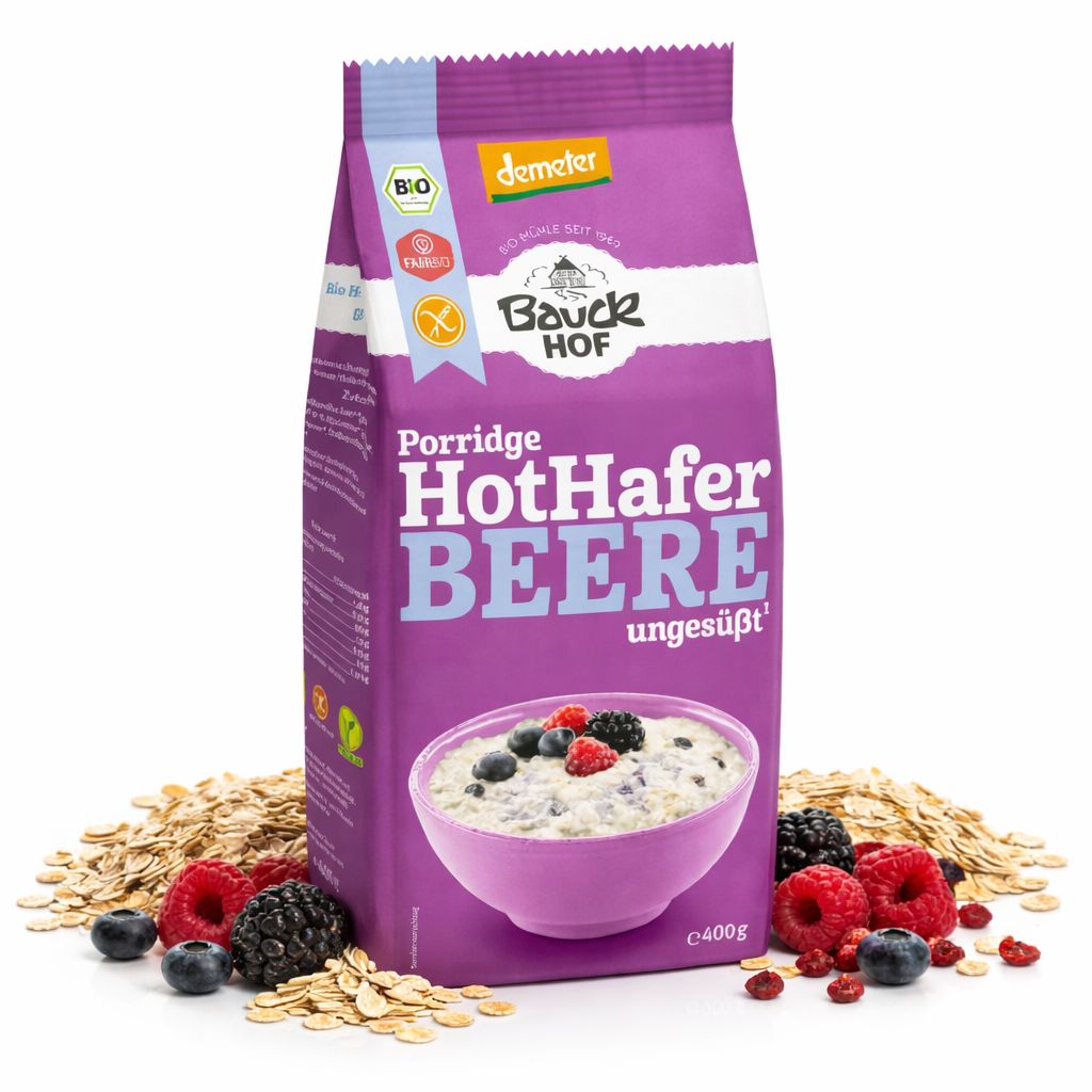 Bauckhof Hot Hafer Porridge mit Beeren, glutenfrei, Demeter-zertifiziert, 400g Packung mit Schüssel und Beeren.