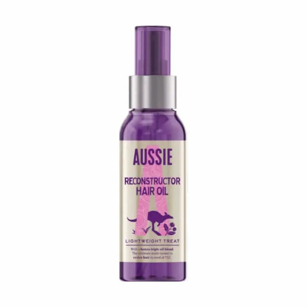 Violette Flasche mit Sprühkopf. Aufschrift: Aussie Reconstructor Hair Oil. Enthält Macadamia-, Jojoba- und Avocadoöl.