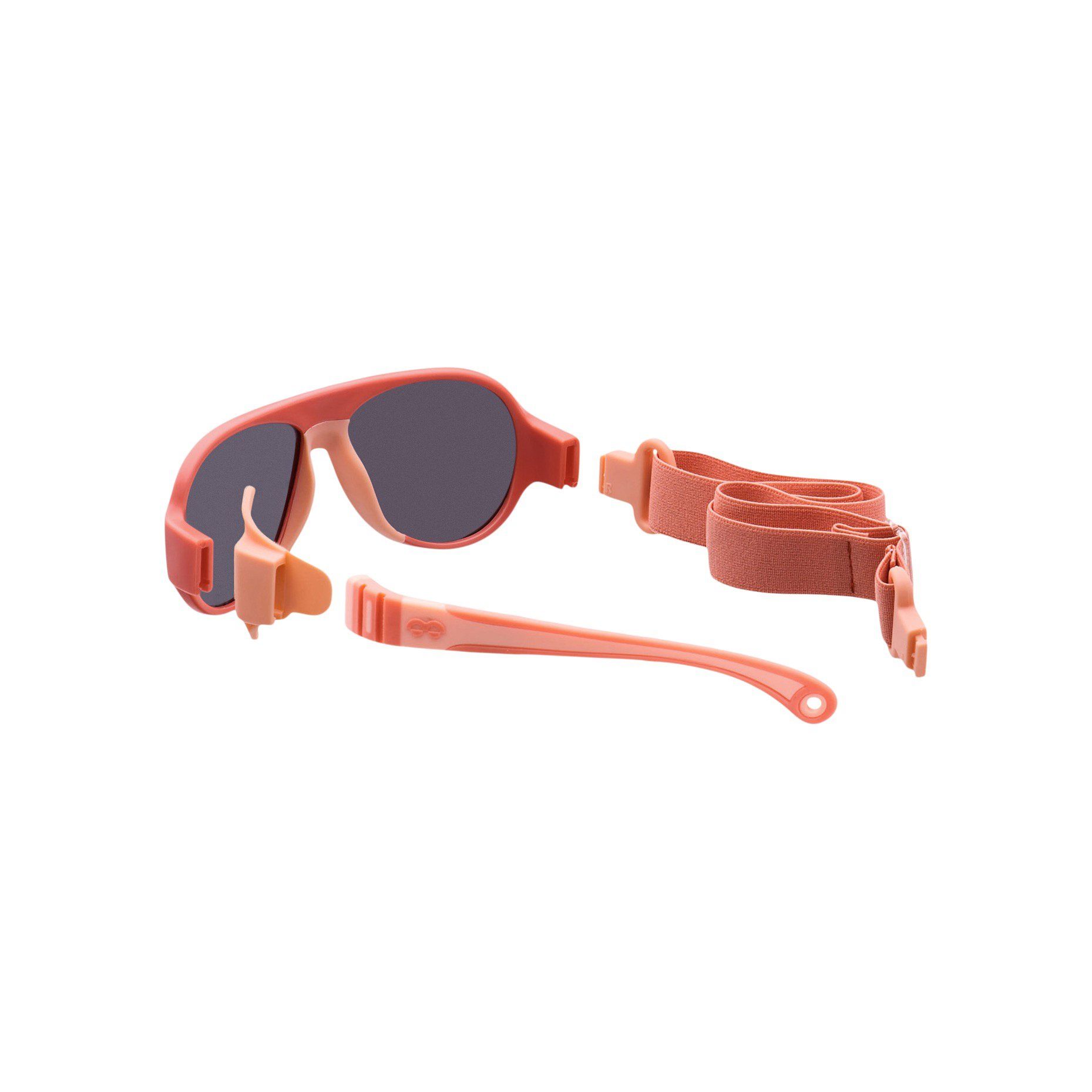 Zerlegte rosa Sonnenbrille. Bügel, Nasenpads und Brillenband. Einzelteile.