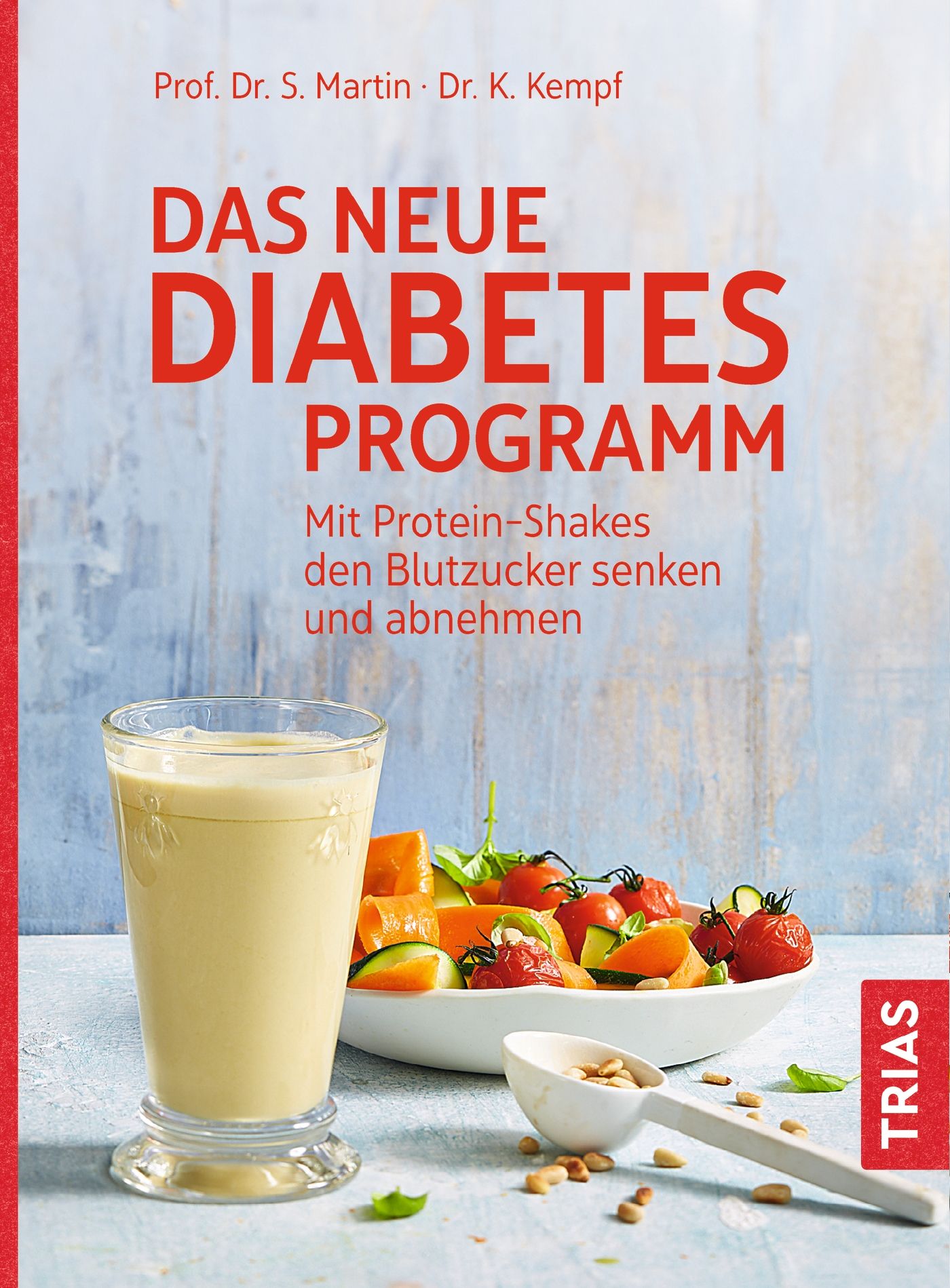 Buchcover mit Titel "Das neue Diabetes Programm". Daneben Glas mit Getränk, Teller mit Gemüse, Löffel mit Samen.