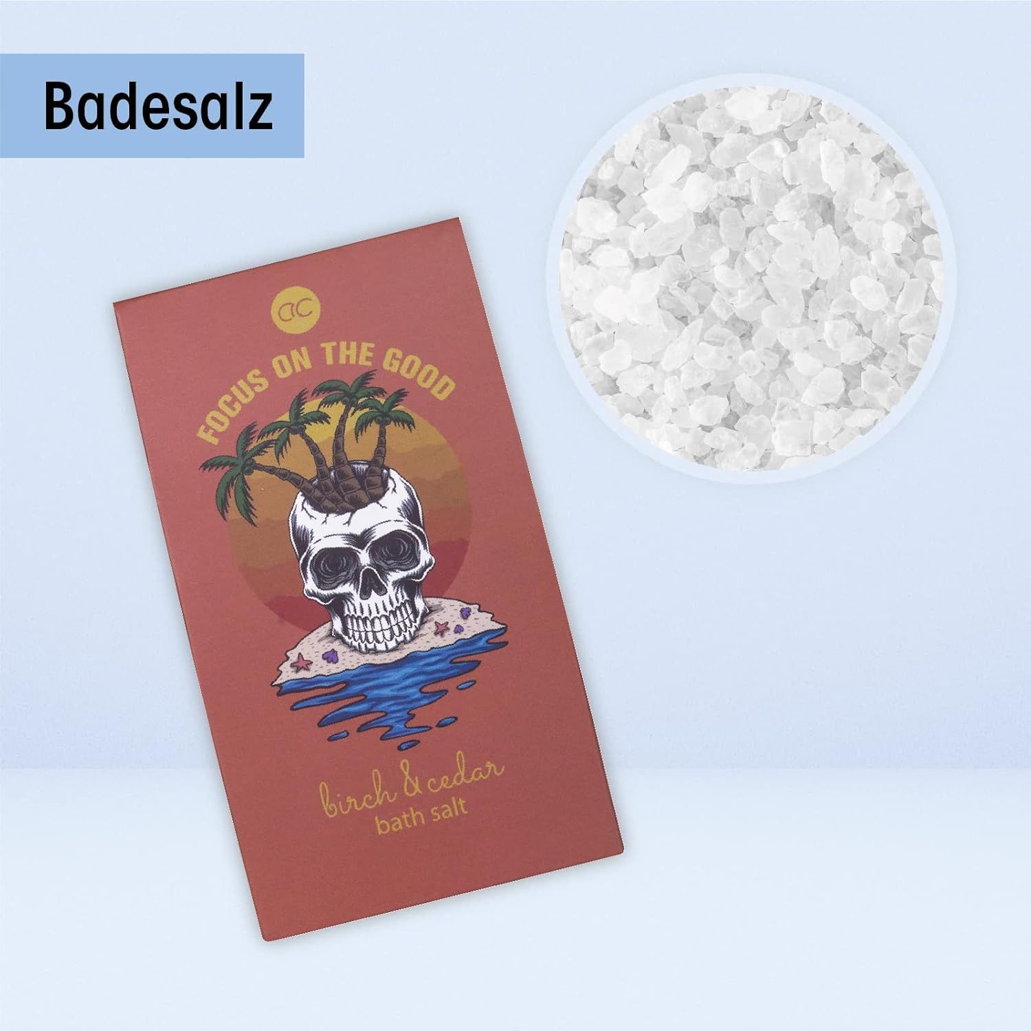 Badesalz in einer Packung und in einer Schale. Aufdruck: Totenkopf mit Palmen. Aufschrift: FOCUS ON THE GOOD. Farbe: rot.