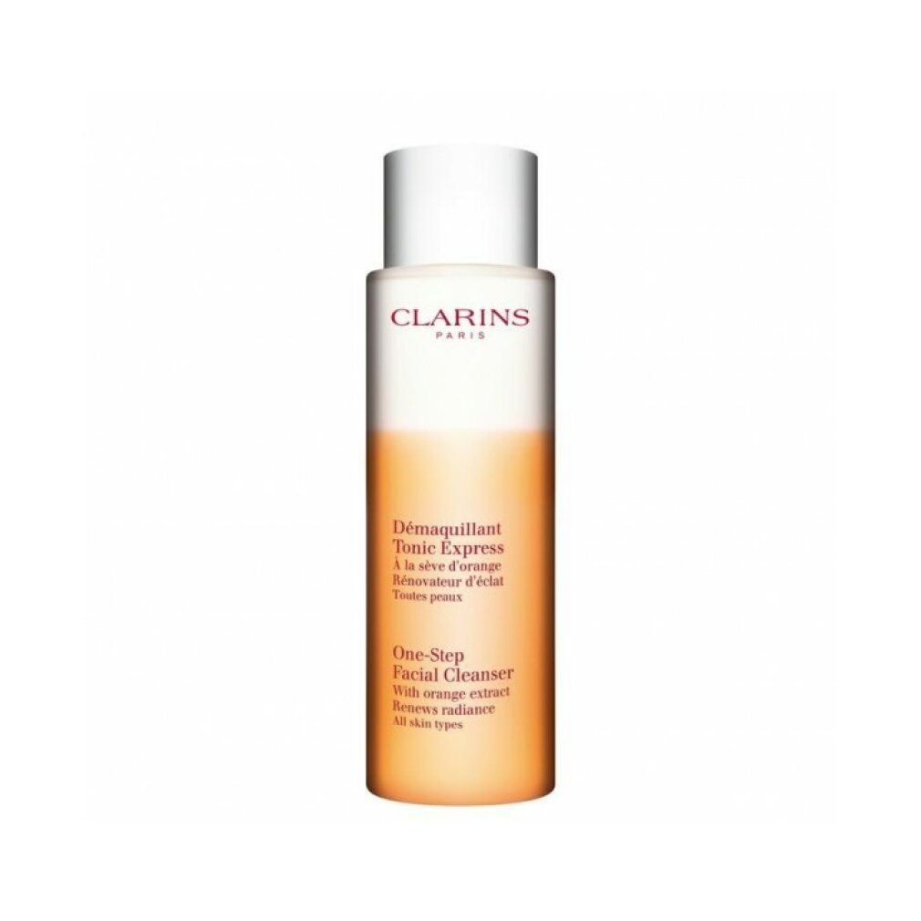 Clarins One-Step Facial Cleanser. Flasche mit orangefarbener Flüssigkeit. Aufschrift: Clarins Paris, Tonic Express, One-Step Facial Cleanser.