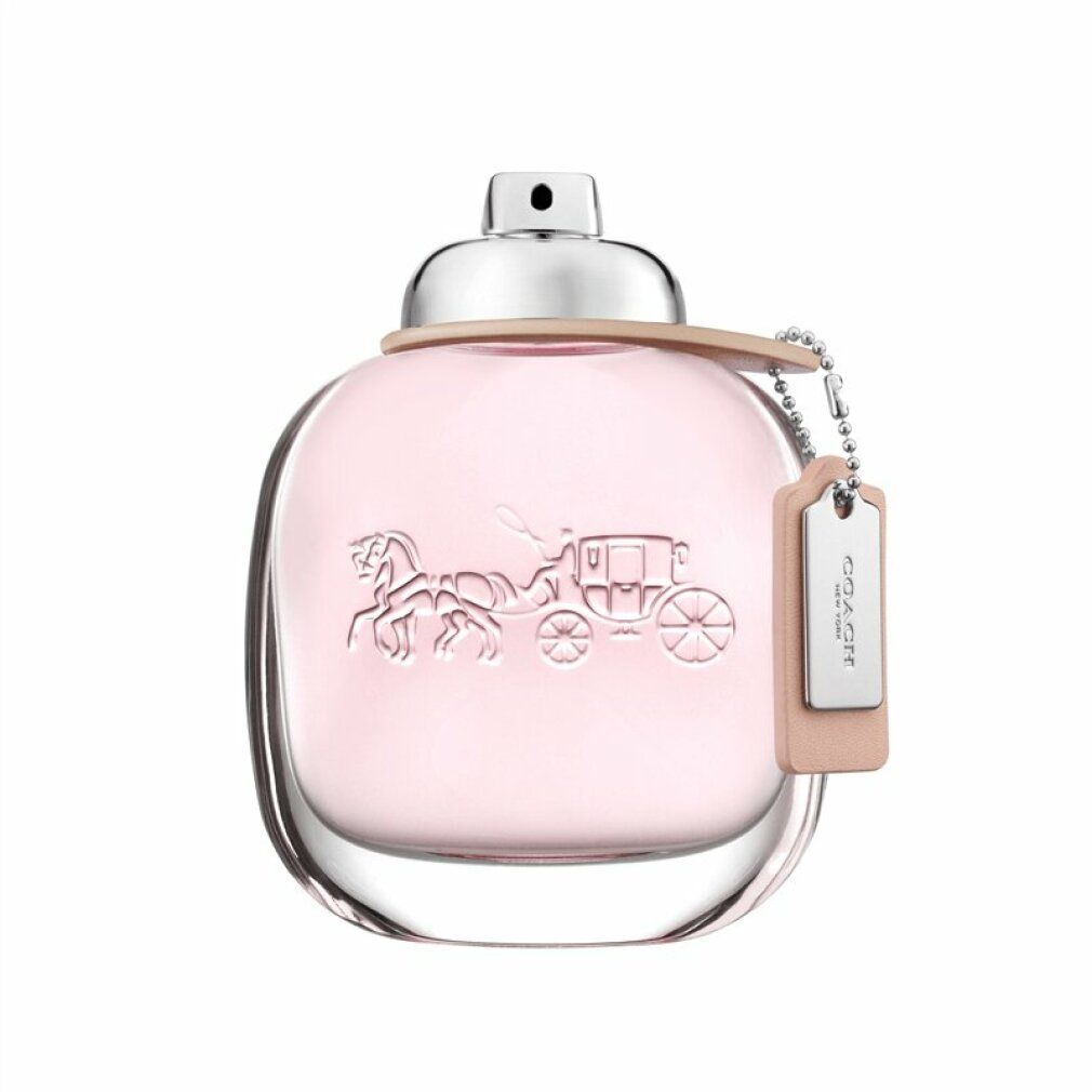 Rosa Eau de Toilette Flakon. Logo und Schriftzug COACH. Anhänger mit Logo. Glasflakon. Hellrosa Flüssigkeit.