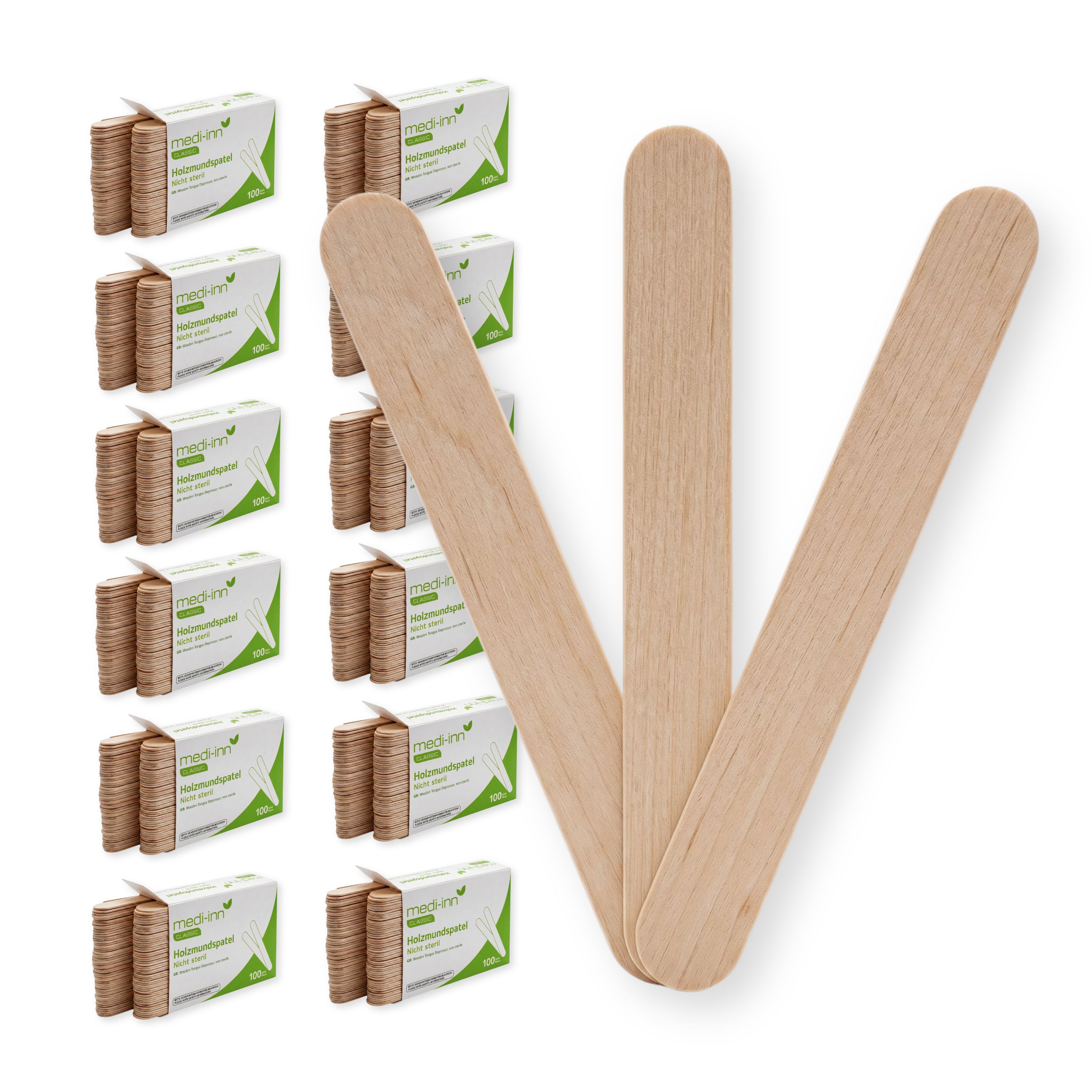 Zwölf Packungen mit Holzmundspateln, daneben drei einzelne Spatel.