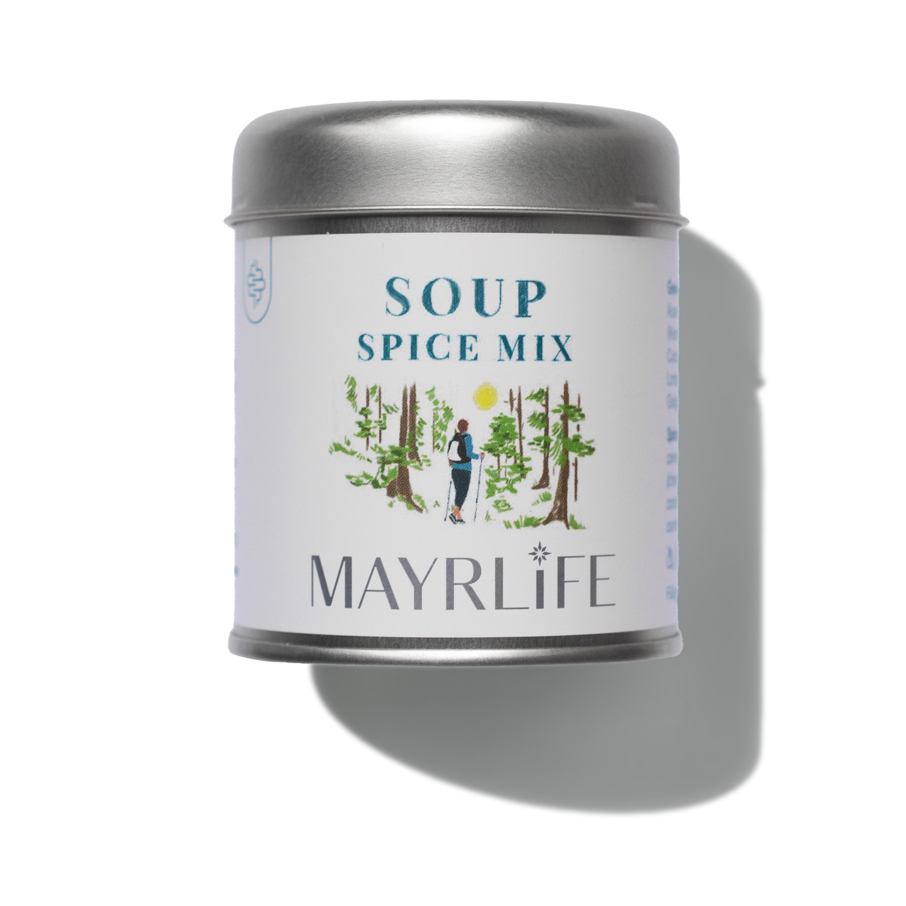 Runder Metallbehälter mit Deckel. Aufschrift: SOUP SPICE MIX. Illustration einer Person im Wald. MAYRLIFE-Logo.