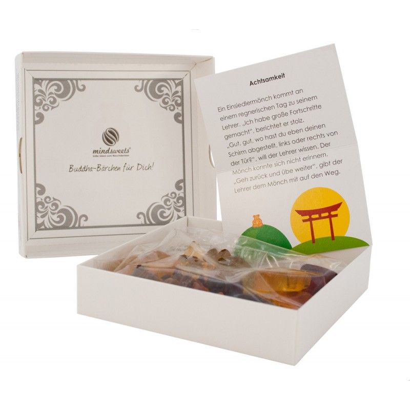 Geöffnete Box mit "Mindsweets"-Logo und "Buddha-Bärchen für Dich!". Innen: Gummibärchen in Folie, Textblatt.