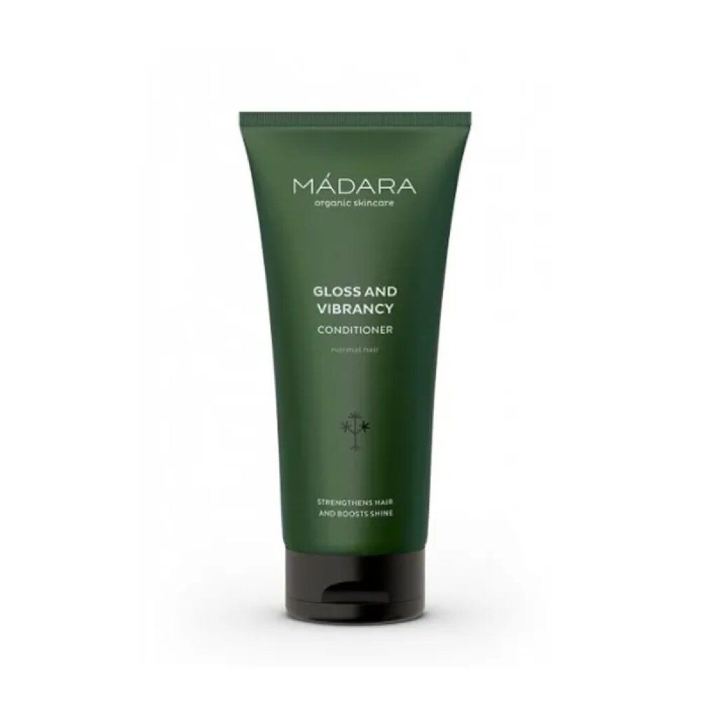 Grüne Tube mit Produktnamen und Logo. Text: Gloss and Vibrancy Conditioner. Für normales Haar. Stärkt das Haar und verleiht Glanz.