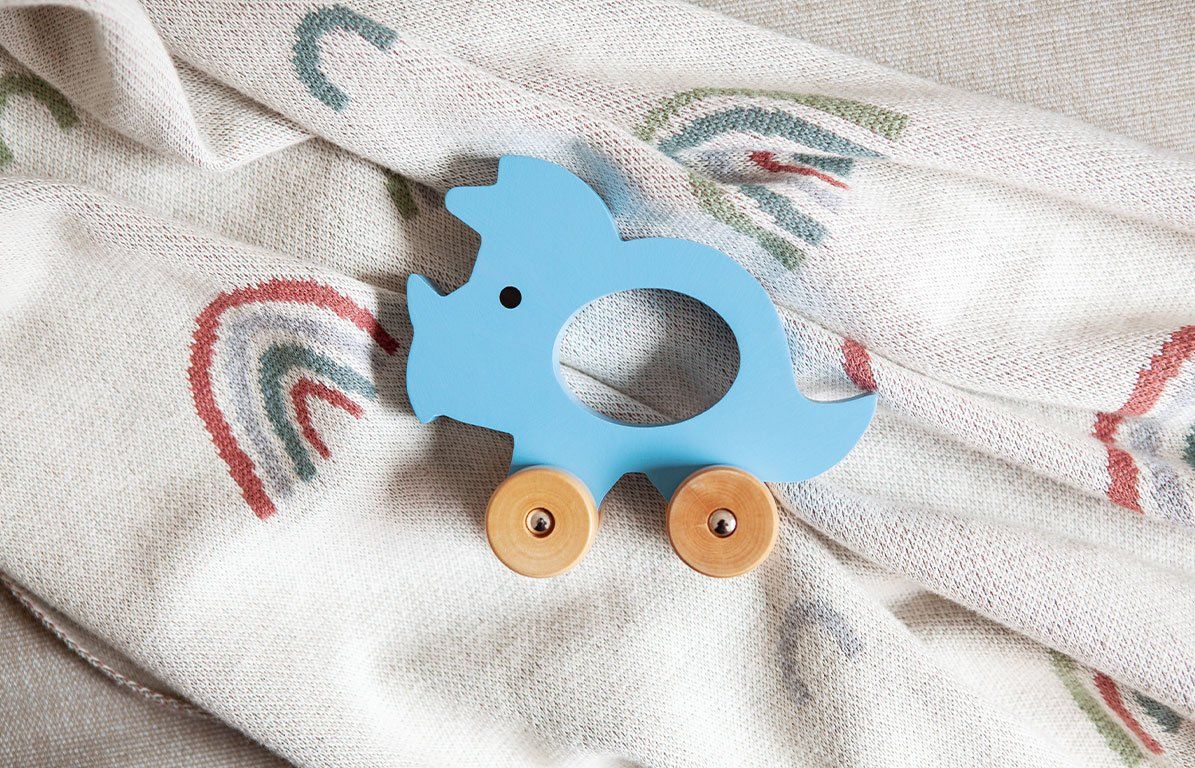Kindsgut Schiebetier Triceratops