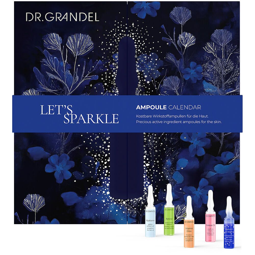 Dr. Grandel Adventskalender. Dunkelblauer Hintergrund mit floralen Elementen. Mehrere Ampullen liegen vor dem Kalender.
