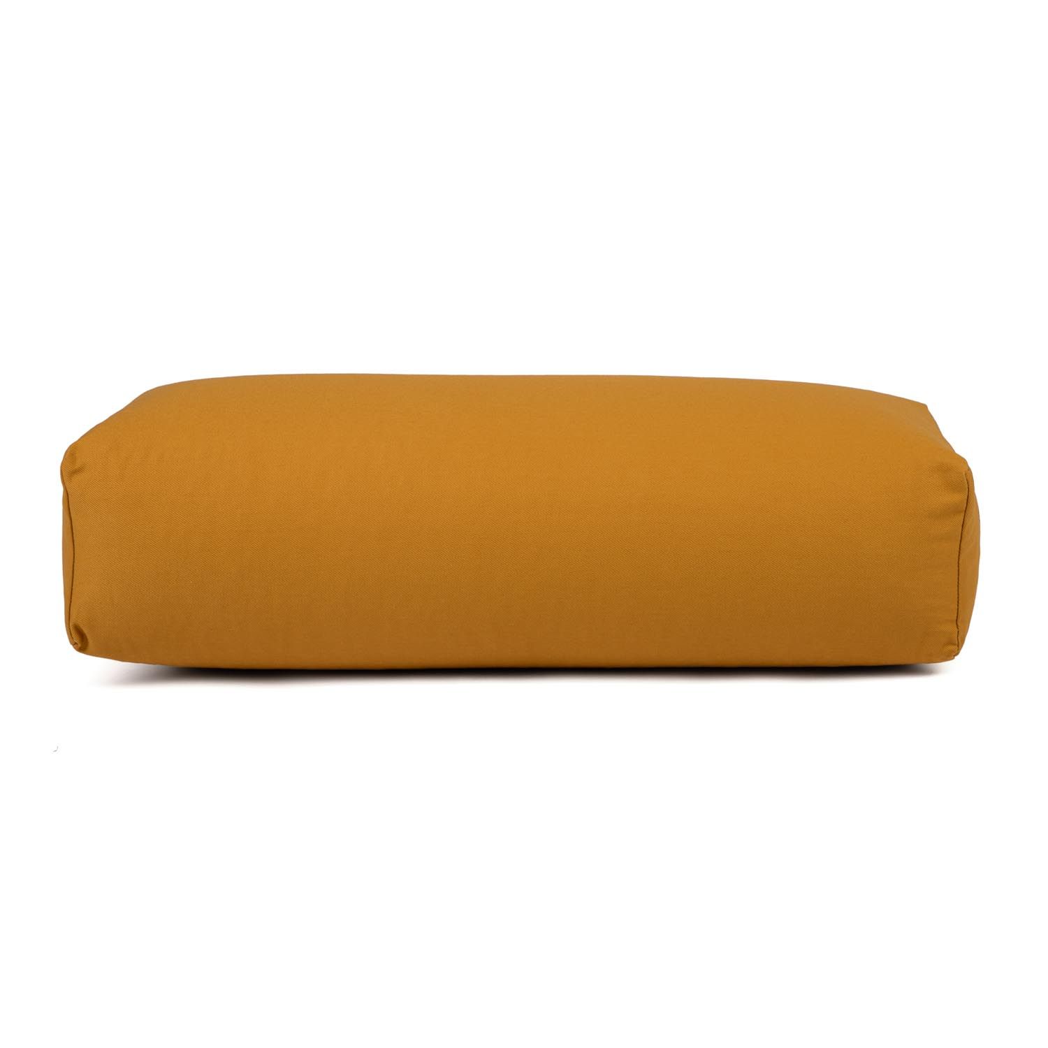 Senfgelbes Yoga-Bolster, rechteckig, mit Reißverschluss.