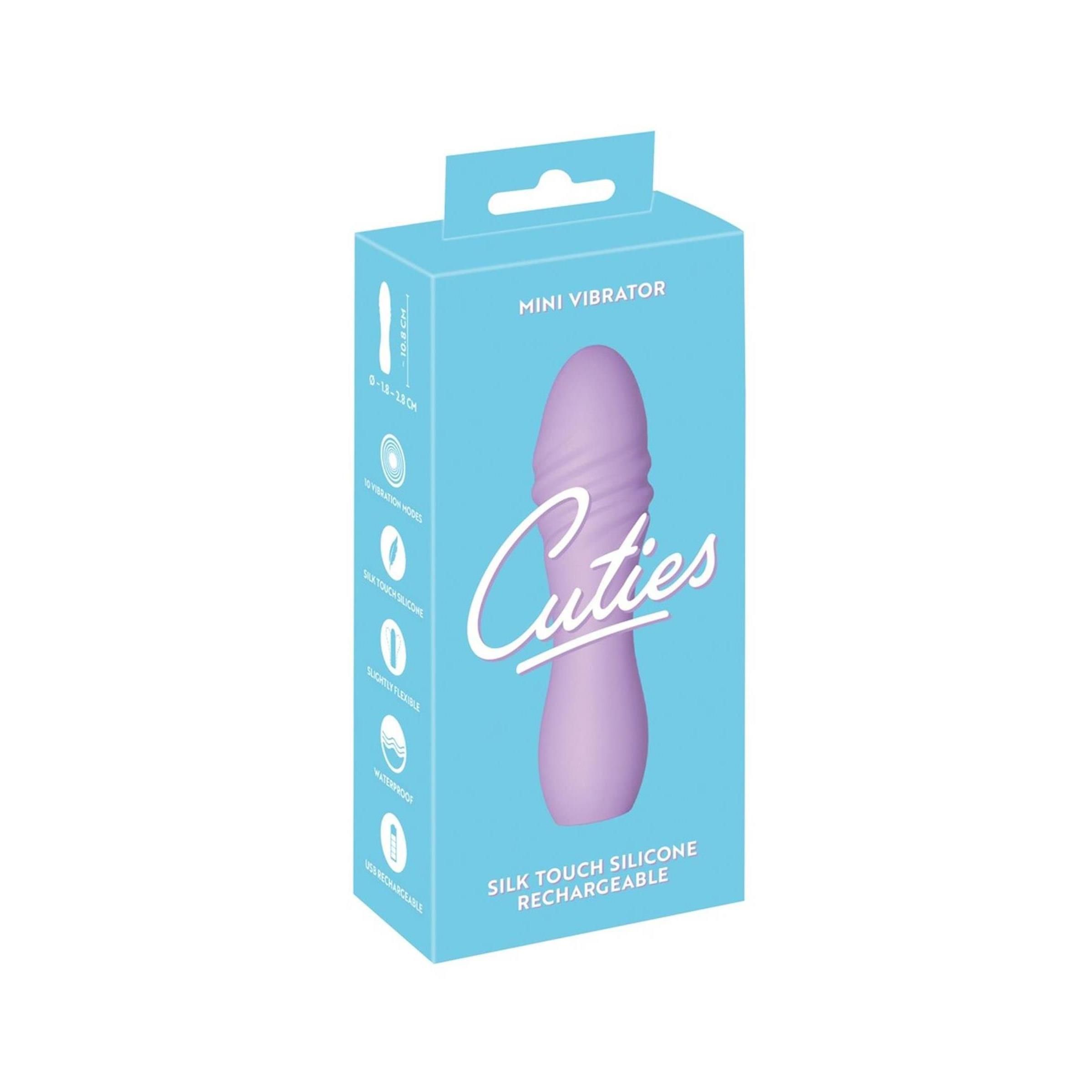 Verpackung mit lila Vibrator. Aufschrift: Cuties, Mini Vibrator, Silk Touch Silicone, Rechargeable.