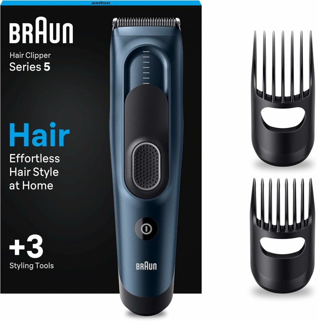 Haarschneider mit Zubehör. Blaues Gerät mit schwarzem Griff und Aufsätzen. Verpackung mit Markenlogo und Produktbezeichnung.