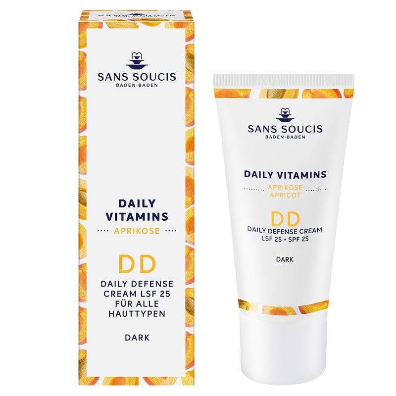 Creme-Tube und Schachtel. Aufschrift: Sans Soucis, Daily Vitamins, Aprikose, DD Daily Defense Cream LSF 25, Dark.