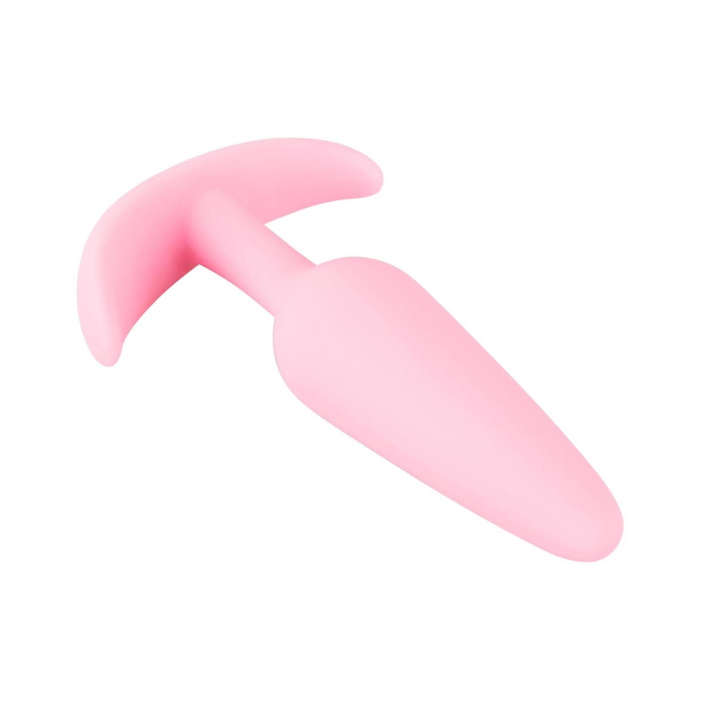 Rosa Plug mit konischer Spitze und gebogener Basis. Aus weichem Material.