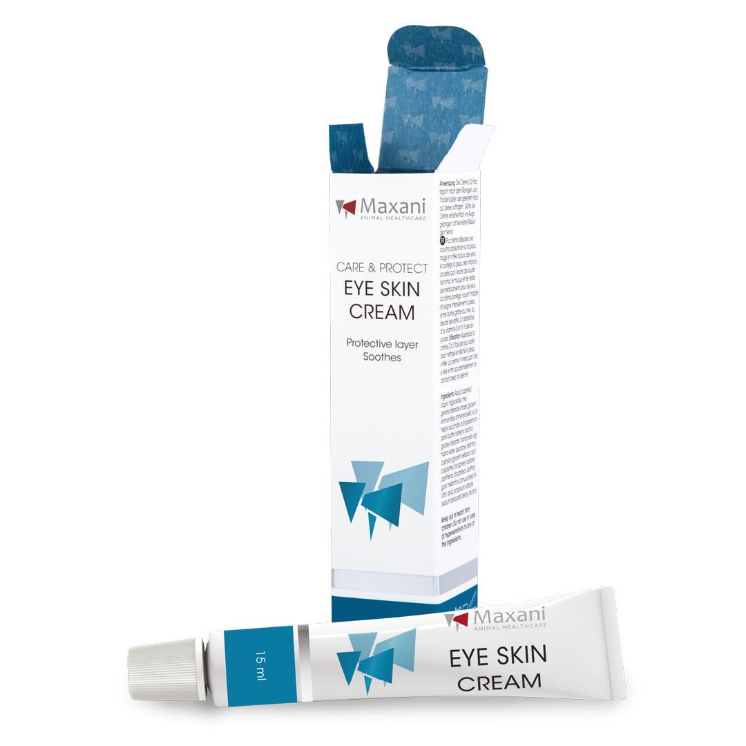 Weißes Tube und Schachtel mit "EYE SKIN CREAM"-Aufdruck. Marke: Maxani. Schachtel mit blauem Muster. Tube mit 15 ml.
